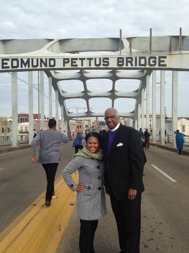  Bishop A.J. Richardson and Bethel AME member Kara Irby stand at the historical Edmund Pettus Bridge.   