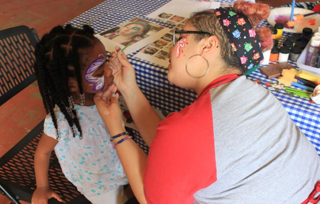 Photos by Keytron Hill  Youth faces were painted in a venue they occupied to themselves.