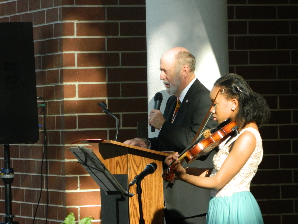 Peter Cowdrey, Volunteer at the Museum of History and Samantha Crawford Leon High School Violinist, who performed the Negro National Anthem is pictured above.