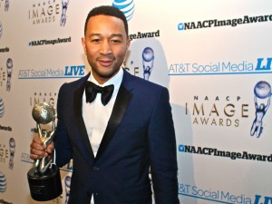 Singer John Legend holds his NAACP President’s Award for his work and  philanthropy.                                                              (Mesiyah McGinnis/LA Sentinel)