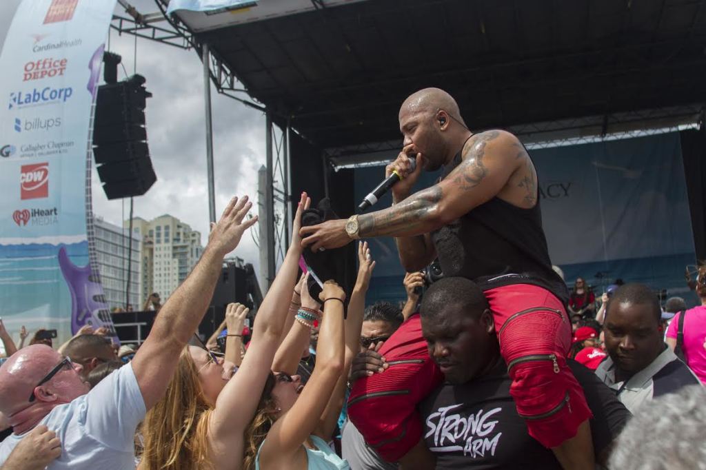 Award-winning hip hop artist Flo Rida keeps the crowd hyped at the 11th annual Florida AIDS Walk and Music Festival, on March 20, 2016 in Fort Lauderdale, Florida. The event, produced by the AIDS Healthcare Foundation (AHF) raised over $1,200,000 to provide services and support Floridians living with HIV/AIDS. ( Photo by Jesus Aranguren / AP Images for AIDS Healthcare Foundation )