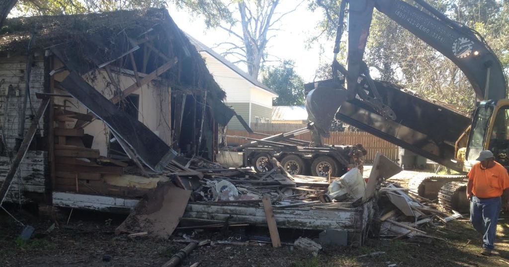 A demolition team took down the building that was once home of Shingles Chicken House. Photo by St. Clair Murraine