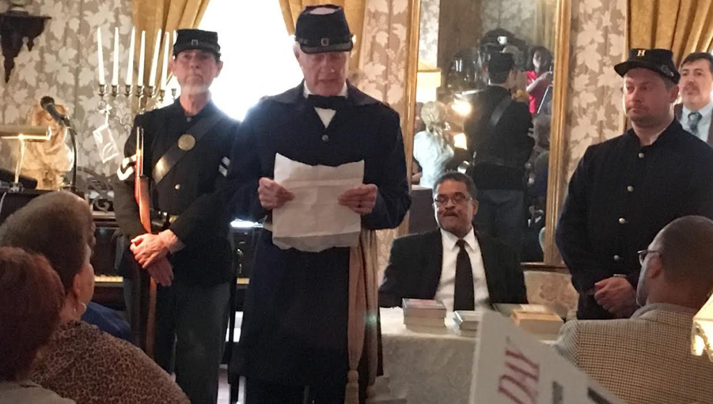 Brian Bibeau, second left, reads the Emancipation Proclamation in a portrayal of Union Brigadier General Edward M. McCook. Photo by Haylee Bell 