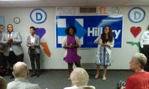 Regional organizing directors Tierra Ward (left) and Sarah Brandon (right) welcome the crowd to the grand opening of Clinton’s campaign office. 