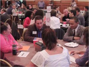 Leon County Commissioner Bryan  Desloge engaged in conversations at one of the 14 tables.