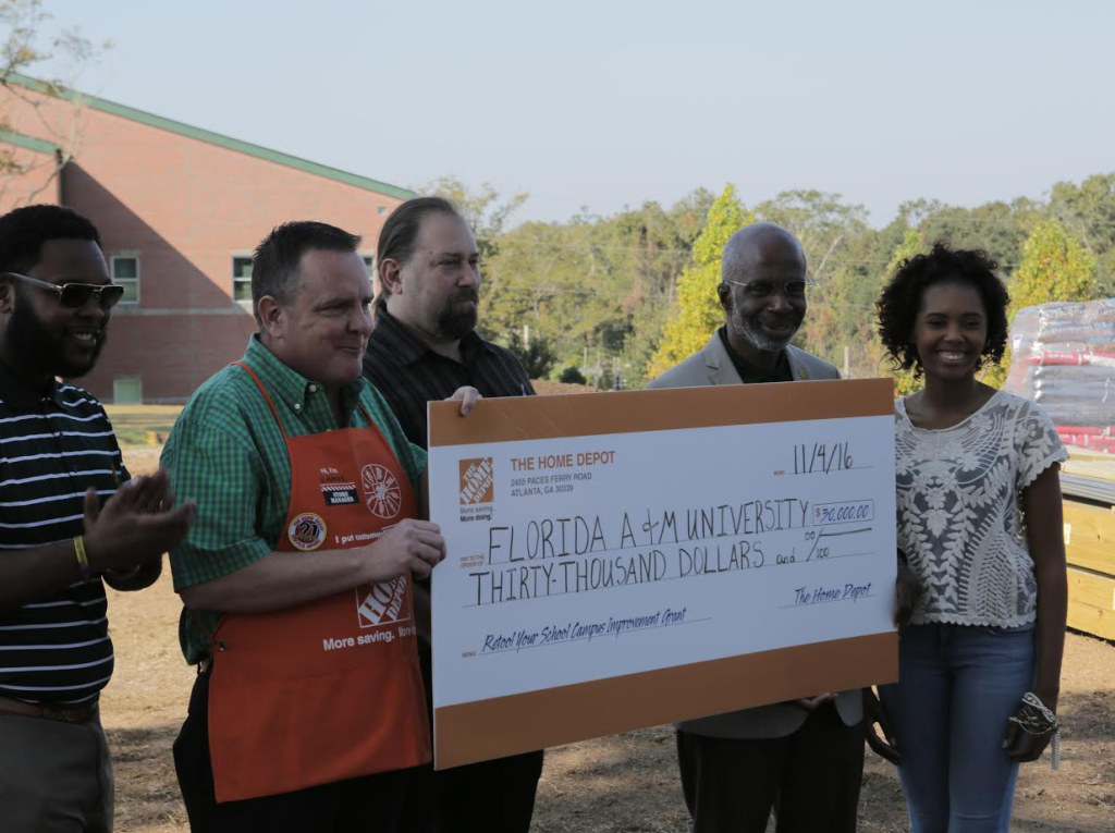 Right to left: Jaylen Smith, Lamar Brogdon, Miguel Alverez, Dr. Larry Robinson and Andrea Pugh 