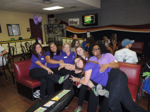 Team Big Brother Big Sister stopped from their bowling for a moment to pose for a picture. Photo by Navael Fontus