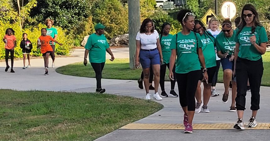 Links members walk to promote healthy lifestyle