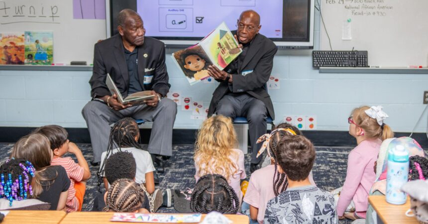 100 Black Men continue tradition of reading to students at Sealey Elementary